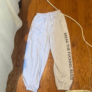 Gray joggers “break the fucking rules “ on the leg